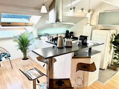 Cuisine ou kitchenette dans l'établissement APPARTEMENT DUPLEX