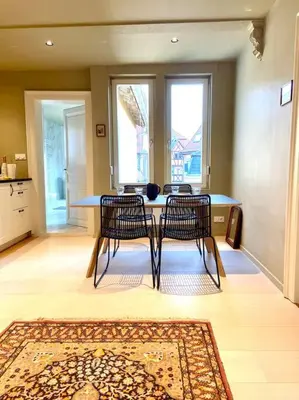 Cuisine ou kitchenette dans l'établissement Suites du trèfle