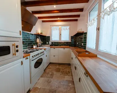 Cuisine ou kitchenette dans l'établissement Home - Retour aux sources