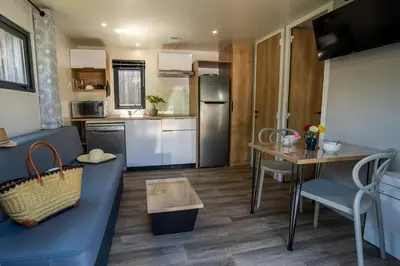 Cuisine ou kitchenette dans l'établissement CAMPING KAYSERSBERG