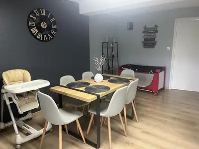 Coin salon dans l'établissement Charmant appartement Cosy porte de Colmar