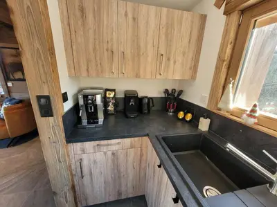Cuisine ou kitchenette dans l'établissement Chalet Louléa - Luxueux, au calme avec Spa