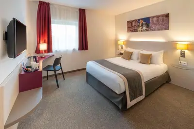 Un ou plusieurs lits dans un hébergement de l'établissement Best Western Colmar Expo
