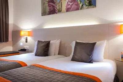 Un ou plusieurs lits dans un hébergement de l'établissement Best Western Colmar Expo