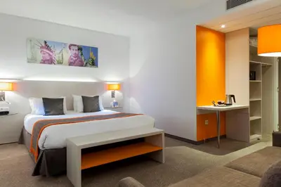 Un ou plusieurs lits dans un hébergement de l'établissement Best Western Colmar Expo