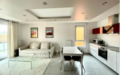 Cuisine ou kitchenette dans l'établissement A few steps from BASEL with Balcony and free private Parking