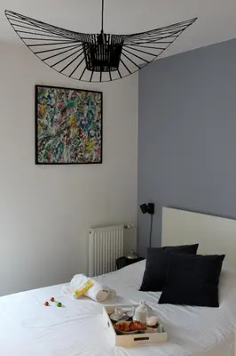 Un ou plusieurs lits dans un hébergement de l'établissement A few steps from BASEL with Balcony and free private Parking