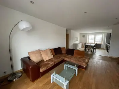 Coin salon dans l'établissement Appartement lumineux avec balcon