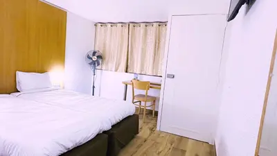 Un ou plusieurs lits dans un hébergement de l'établissement Kyriad ECO - Belfort Bessoncourt