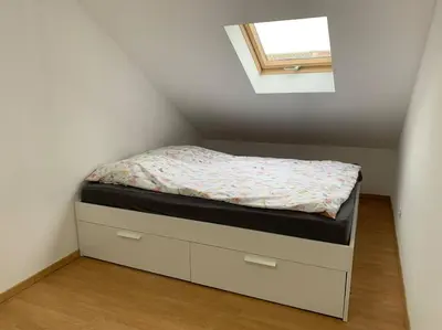 Un ou plusieurs lits dans un hébergement de l'établissement Cozy Little One Room Appartment, a tranquil haven!