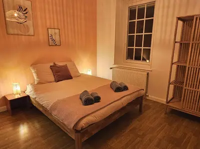 Un ou plusieurs lits dans un hébergement de l'établissement Maison Le Beauregard Bussang