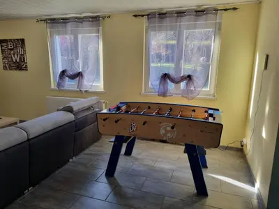 Salle de jeux dans l'établissement Le gîte de Cléo, maison spacieuse et paisible.