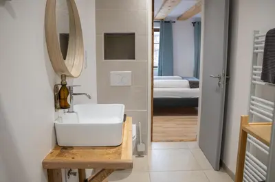Un ou plusieurs lits dans un hébergement de l'établissement Gîte La Grange