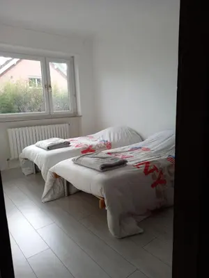 Un ou plusieurs lits dans un hébergement de l'établissement Maison proche du centre de Colmar - Chez Michel