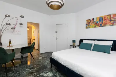 Un ou plusieurs lits dans un hébergement de l'établissement Deluxe studio tout équipé - hyper centre historique