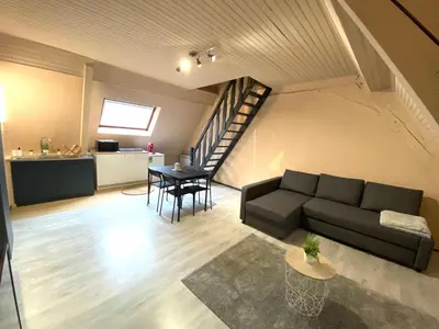 Coin salon dans l'établissement le duplex