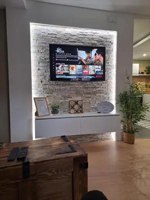 Télévision ou salle de divertissement dans l'établissement Bel Appartement, Sélestat