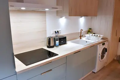 Cuisine ou kitchenette dans l'établissement Entre Vignes et vergers Gite Parenthese
