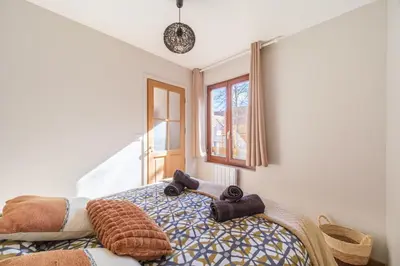 Un ou plusieurs lits dans un hébergement de l'établissement Le Boulanger Windholz