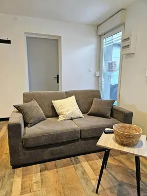 Coin salon dans l'établissement appartement cosy à seloncourt