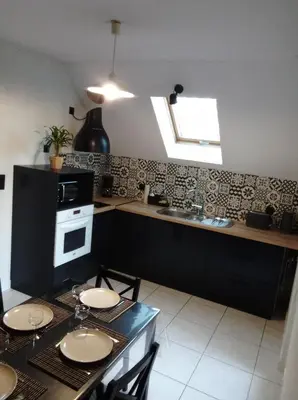 Cuisine ou kitchenette dans l'établissement Appartement près Europapark et Rulantica