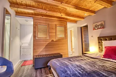 Un ou plusieurs lits dans un hébergement de l'établissement Le Repaire de l'Ours - L'Alcôve de l'Ours - Chambre cosy 2 pers