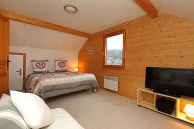 Un ou plusieurs lits dans un hébergement de l'établissement Le Chalet du Lac - Dans un environnement idéal