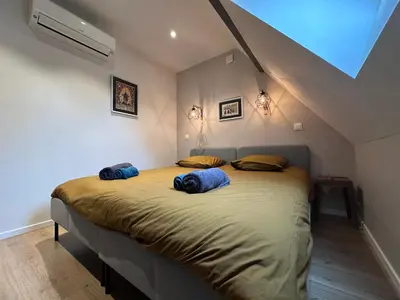 Un ou plusieurs lits dans un hébergement de l'établissement B'm Gretel - Duplex 4 pers - Vue Cathédrale - Centre Historique