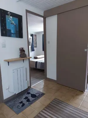 Un ou plusieurs lits dans un hébergement de l'établissement La petite maison Gîte 2 étoiles