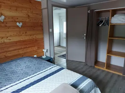 Un ou plusieurs lits dans un hébergement de l'établissement La petite maison Gîte 2 étoiles