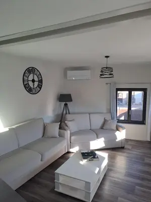 Coin salon dans l'établissement Appartement 3 pièces tout confort, Aux Portes de Colmar