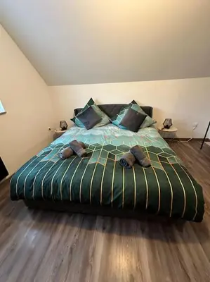 Un ou plusieurs lits dans un hébergement de l'établissement Appartement Algo