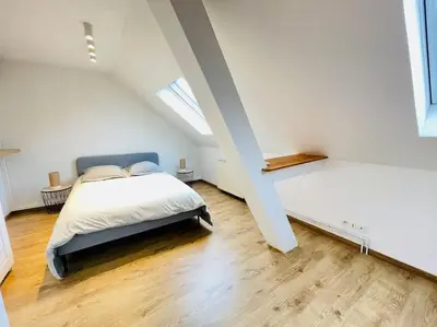 Un ou plusieurs lits dans un hébergement de l'établissement Le gîte d'Emma