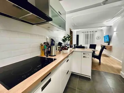 Cuisine ou kitchenette dans l'établissement #The Family moderne et Charme WIFI - TV 4per