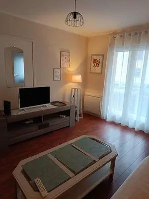 Télévision ou salle de divertissement dans l'établissement LE 46A
