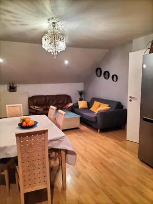 Coin salon dans l'établissement Apparemment 3 chambres