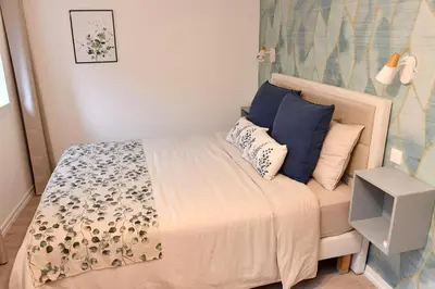 Un ou plusieurs lits dans un hébergement de l'établissement Grand gîte dans maison alsacienne historique