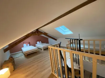Un ou plusieurs lits dans un hébergement de l'établissement Appartement chaleureux au pied des pistes