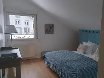 Un ou plusieurs lits dans un hébergement de l'établissement la maison de noemia à Gerardmer