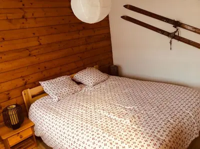 Un ou plusieurs lits dans un hébergement de l'établissement Chalet à Gérardmer - Vue montagne - Calme & Paisible