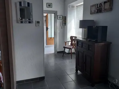 Télévision ou salle de divertissement dans l'établissement Studio côté jardin