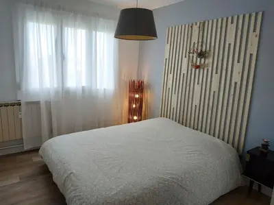 Un ou plusieurs lits dans un hébergement de l'établissement Appartement tout équipé proche General Electric