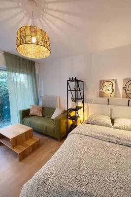 Un ou plusieurs lits dans un hébergement de l'établissement Proche Centre Mulhouse - Studio cosy