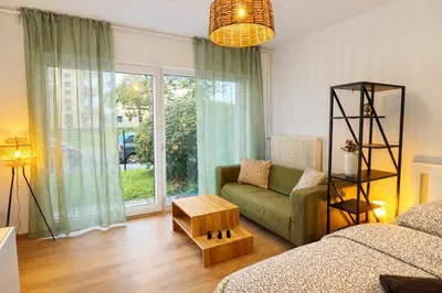 Coin salon dans l'établissement Proche Centre Mulhouse - Studio cosy
