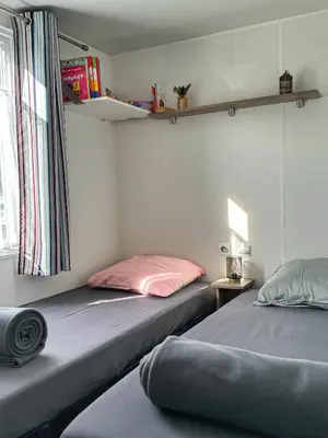 Un ou plusieurs lits dans un hébergement de l'établissement Grand Mobile-Home 6 Places climatisé