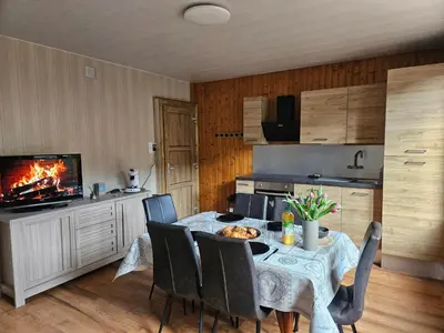 Cuisine ou kitchenette dans l'établissement Appartement Chaleureux Gérardmer proche forêt