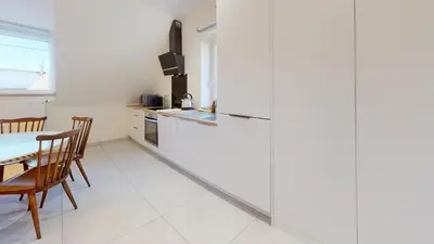 Cuisine ou kitchenette dans l'établissement Maison tilleul de la vallée noble
