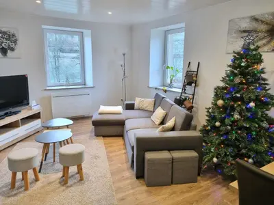 Télévision ou salle de divertissement dans l'établissement Appartement chaleureux 80m2