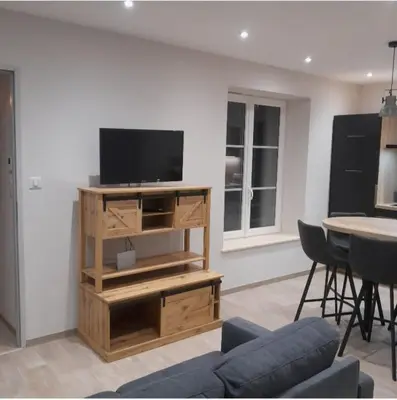 Télévision ou salle de divertissement dans l'établissement Apartment calme
