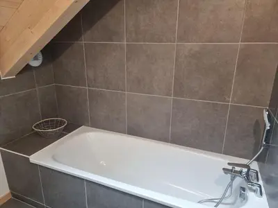 Salle de bains dans l'établissement Le nid de Claude et Nadine